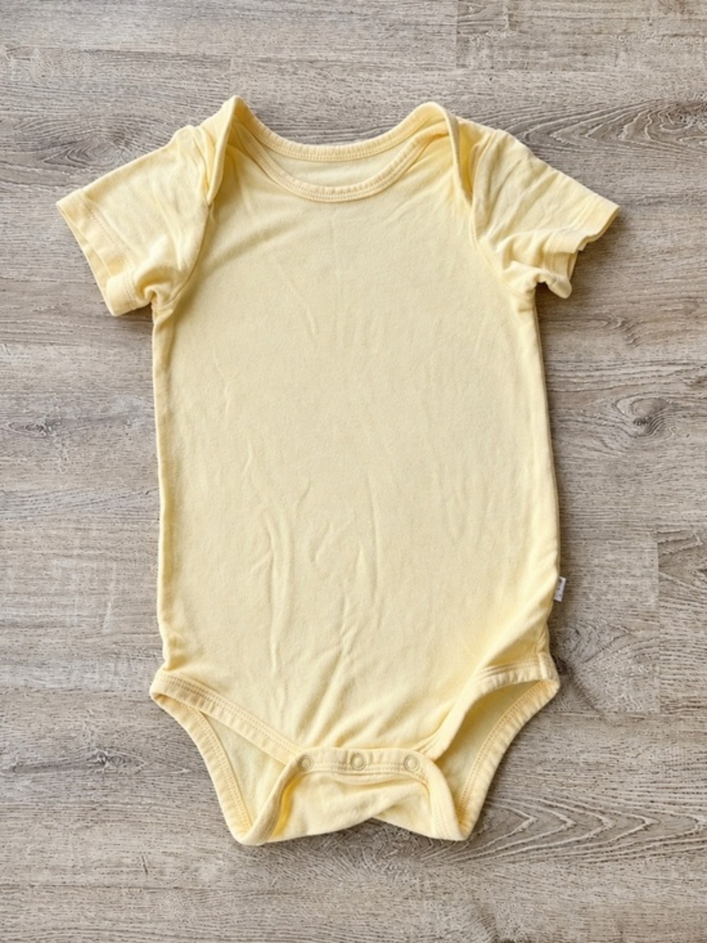 Kyte Baby Bodysuit 6-12M Daffodil Yellow Bamboo Short Sleeve